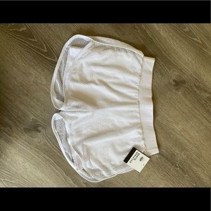 Senita running shorts in white - medium, new with tags